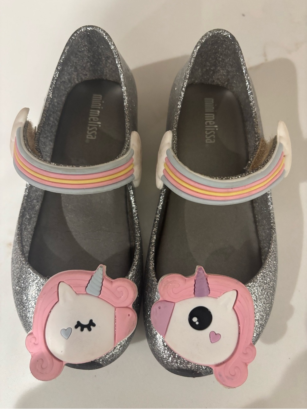 Mini Melissa Silver Glitter Mary Janes with Pink Unicorn Appliqués